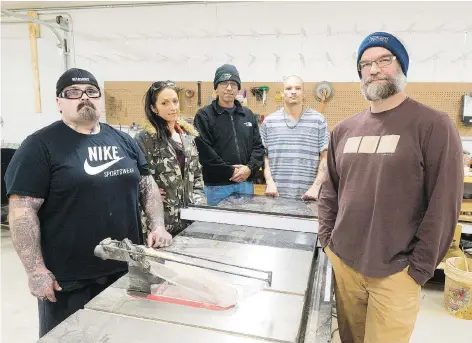  ?? MICHAEL BELL ?? Ron Burling, Tara Amyotte, Vincent Wolfe, Cody Varley and Spurgeon Root stand in a workshop located at Healing Hearts Ministry. Root is the director of ReGEN, Regina Gang Exit Network, a program to help youth leave gangs and become a positive influence...