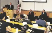  ?? ?? Presidenti­al candidates Lennor Johnson and Javier Ayala respond to questions from moderator Ric Epps.