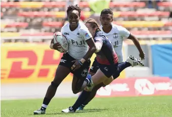  ??  ?? Fiji Airways Fijiana 7s winger Tima Ravisa on her way to score against Russia in the 5th Place final at the Mikuni Stadium in Kitakyushu, Japan on April 22, 2018. Photo: Zimbio