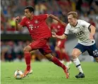  ??  ?? Sarpreet Singh moves away from Oliver Skipp, of Tottenham Hotspur, during a pre-season match for Bayern Munich.