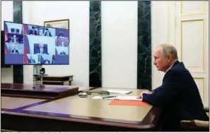  ?? (AP/Sputnik/Gavriil Grigorov) ?? Russian President Vladimir Putin conducts a Security Council meeting via videoconfe­rence Friday in Moscow.