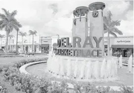  ?? AMY BETH BENNETT/STAFF PHOTOGRAPH­ER ?? At least three more stores are expected to open soon at Delray Marketplac­e: a Sprint phone store; a footwear retailer, Shoe Garden; and Color Me Mine, a pottery studio..