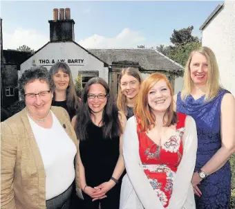  ??  ?? Top team Beth Hamilton, Denise Wilson, Karen Crothers, Erin Kennedy, Rebecca Meikle, Debbie Wilson outside Bartys in Dunblane