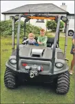  ?? 01_B31emerg03 ?? David and Anna Peebles of Glasgow test drive an all-terrain vehicle.