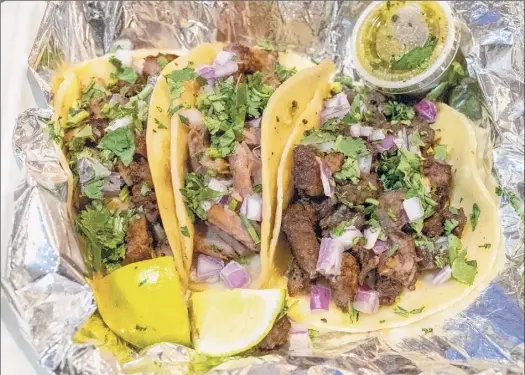  ?? Photos by Konrad Odhiambo / For the Times Union ?? Food from La Capital Tacos in Troy.