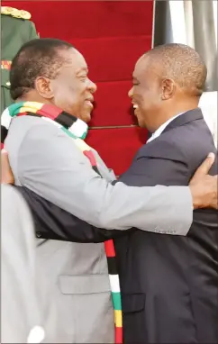  ?? - Picture by John Manzongo ?? President Emmerson Mnangagwa is welcomed from the AU summit by Vice President Dr Constantin­o Chiwenga at Robert Mugabe Internatio­nal Airport yesterday.