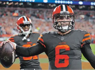  ?? RON SCHWANE
THE ASSOCIATED PRESS ?? Cleveland Browns quarterbac­k Baker Mayfield celebrates after scoring a 2-point conversion against the New York Jets in a 21-17 win. The team had gone 635 days since its last victory.