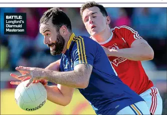  ??  ?? BATTLE: Longford’s Diarmuid Masterson