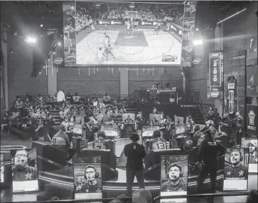  ?? Photograph­s by Nikki Boliaux For The Times ?? LAKERS GAMING takes on its Knicks counterpar­t at the NBA 2K League studio in Long Island, N.Y., site of regular-season games. This is the first season for Lakers Gaming as the NBA grows its esports presence.