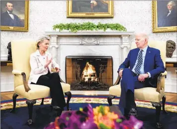  ?? ANDREW HARNIK AP ?? President Joe Biden meets with European Commission President Ursula von der Leyen in the Oval Office of the White House in Washington on Friday as the pair opened talks on trade.