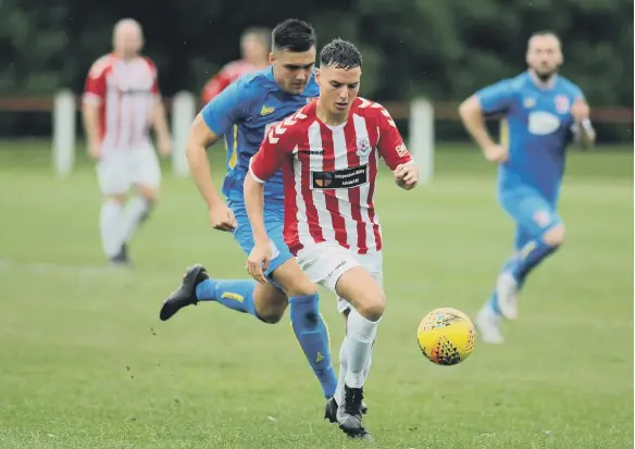  ?? ?? Seaham Red Star (red/white) in action against Sunderland RCA in a recent game.