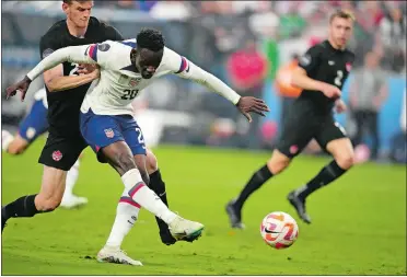  ?? ?? Folarin Balogun of the United States scores a goal during the first of of Sunday night’s 2-0 win over Canada in the CONCACAF Nations League Final in Las Vegas.