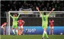  ?? ?? Contrastin­g emotions at the Volkswagen Arena after Leah Wliiamson’s own goal settled the tie. Photograph: Focke Strangmann/ EPA