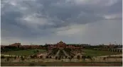  ?? — PTI ?? Dark clouds gather in the sky over Akshardham temple, in New Delhi on Sunday.