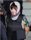  ??  ?? Doan Thi Huong is escorted as she leaves Shah Alam High Court