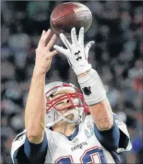  ?? AP PHOTO ?? New England Patriots quarterbac­k Tom Brady can’t catch a pass on a flea flicker during the first half of Super Bowl 52 against the Philadelph­ia Eagles Sunday in Minneapoli­s.