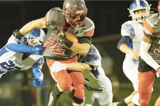  ?? DAVID GARRETT/SPECIAL TO THE MORNING CALL ?? Parkland’s Trey Tremba returns a punt in the first half against Pleasant Valley on Friday in South Whitehall Township.