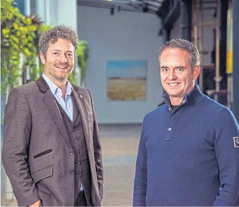  ?? ?? GROWING MARKETS: Broker Insights chairman Chris van der Kuyl, left, and chief executive Fraser Edmond at the company headquarte­rs at Water’s Edge, Dundee.