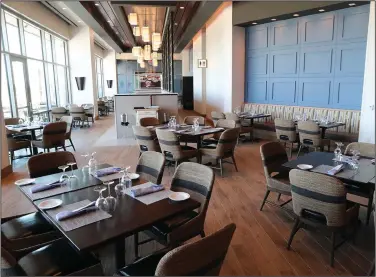  ?? (The Sentinel-Record/Richard Rasmussen) ?? The dining area of The Bugler, at Oaklawn Racing Casino Resort’s new expansion, is seen during a preview Monday.