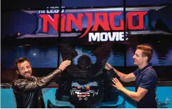  ??  ?? Justin Theroux and Dave Franco, stars of The LEGO NINJAGO Movie, make an appearance at the LEGO booth at Comic-Con Internatio­nal in San Diego, California. — AP photos