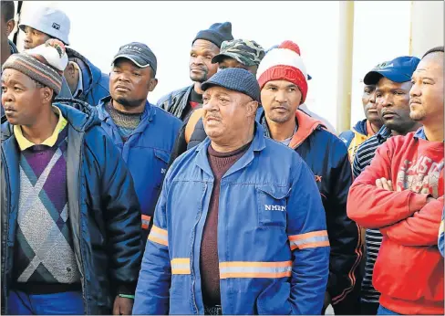  ?? Picture: DENEESHA PILLAY ?? DISGRUNTLE­D STAFF: Striking municipal workers before an agreement was reached to return to work