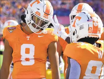  ?? John Raoux Associated Press ?? NICO IAMALEAVA (8) showed his potential in the Jan. 1 Citrus Bowl as he led Tennessee to a 35-0 win.