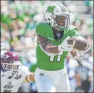  ?? The Associated Press ?? Sholten Singer
Marshall tight end Xavier Gaines makes a touchdown catch Saturday in the Thundering Herd’s 59-0 win over Eastern Kentucky at Joan C. Edwards Stadium.