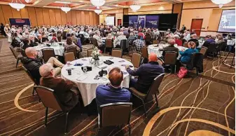  ?? Wade Payne/Associated Press ?? Participan­ts listen earlier this month as a presenter speaks during an election conspiracy forum in Franklin, Tenn. Such conference­s have proliferat­ed since the last presidenti­al election.