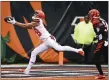  ?? GARY LANDERS — THE ASSOCIATED PRESS ?? Browns wide receiver Damion Ratley catches a 46-yard touchdown pass ahead of Bengals cornerback Darius Phillips during the first half Dec. 29in Cincinnati.