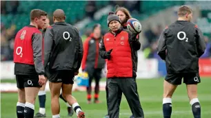  ?? Reuters ?? England head coach Eddie Jones with his players during a tarining session. —