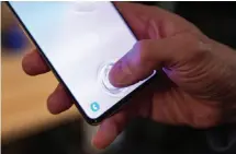  ??  ?? The S10+ has an ultrasonic fingerprin­t sensor built into the display, which has a cool animation when it’s working.