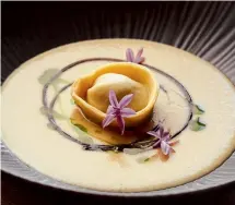  ?? ?? Top: barbecued lamb loin is ‘filtered through a glittering gastronomi­c prism’. blue cheese tortellini in an onion purée ‘that whispers and purrs’. Above right: Tallow ‘shimmers with heartfelt hospitalit­y’