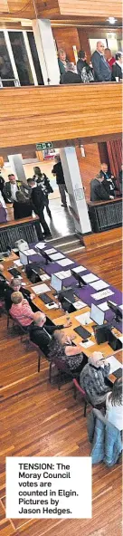  ?? ?? TENSION: The Moray Council votes are counted in Elgin. Pictures by Jason Hedges.