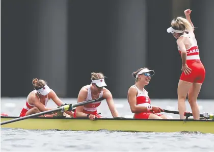  ?? NAOMI BAKER/GETTY IMAGES ?? Madison Mailey, Sydney Payne, Avalon Wasteneys and cox Kristen Kit celebrate their gold medal in the women's eight Friday on Sea Forest Waterway, Canada's first in the event since 1992. Not shown: Andrea Proske, Susanne Grainger, Lisa Roman and Christine Roper.