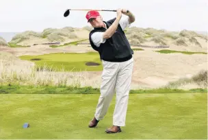  ?? PHOTO: REUTERS ?? Wrecking ball . . . Donald Trump practises his swing at the 13th tee of his Trump Internatio­nal Golf Links course on the Menie Estate near Aberdeen, Scotland.