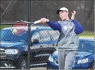  ?? AUSTIN HERTZOG - DIGITAL FIRST MEDIA ?? Phoenixvil­le’s Graham Light hits a forehand against SpringFord’s Malchu Pascual at No. 1 singles Thursday.