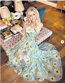  ?? ?? Nicky Hilton Rothschild in a Oscar de la Renta poppy-print dress