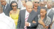  ??  ?? ON PAROLE: Tony Yengeni leaves Malmesbury Prison on parole with his wife, Lumka, second left, his daughter, Nandi, and his son, Mandla, in 2007 after serving four months of his five-year sentence for fraud