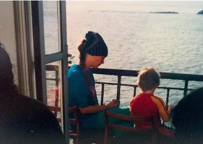  ??  ?? Mother and son on holiday in Ireland with Joseph aged four (above) and eight (right). Above right: Joseph and Sandy with his daughter Elsie, St Stephen’s Day 2015. Far right: Joseph (left) and bandmate Tom performing in a record store as Solomon Grey