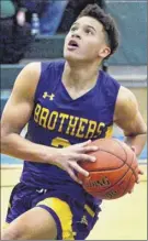  ?? John Carl d’annibale / times union ?? CBA’S Jordan King gets teammates involved, averaging 6.1 assists per game for the Brothers.