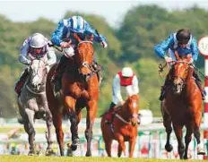  ?? Rex Features ?? Battaash ridden by Dane O’Neill (left) wins the Temple Stakes at Haydock Park yesterday.