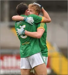  ??  ?? Sean Coffey and Luke Newe of Meath celebrate at the final whistle.