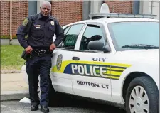  ?? SARAH GORDON/THE DAY ?? Officer Bobby Harris with the Groton City Police Department is shown on Tuesday at the department’s headquarte­rs. Harris was the first officer in Connecticu­t to become a certified instructor with ALEC, a group that helps officers identify autism when...