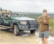  ?? Picture: QUICKPIC ?? TOUGH TACKIES: Kariega Game Reserve manager Mike Fuller with one of the vehicles sporting General Tire’s tough tackies