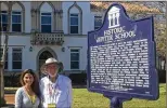  ?? POST BILL DIPAOLO / THE PALM BEACH ?? Paolo ArdelaRile­y and Jim Sparger want to restore the auditorium in the 1927 Jupiter High School.