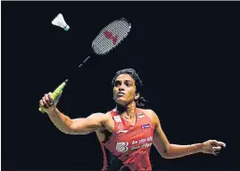  ?? ?? PV Sindhu in action during her World Championsh­ip match against Pornpawee Chochuwong.