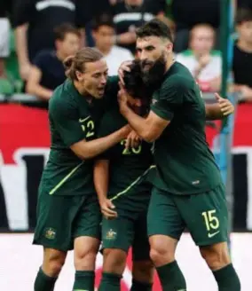  ??  ?? De Socceroos vieren een doelpunt. FOTO REUTERS