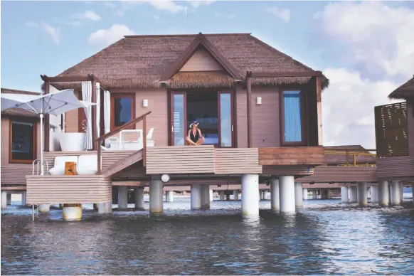  ?? STEVE MACNAULL PHOTO ?? Sandals South Coast has only 12 exclusive over-the-water bungalows built off a heart-shaped dock.