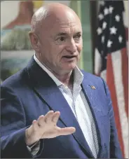  ?? ?? U.S. SEN. MARK KELLY (D-ARIZ.) answers a reporter’s question during a news conference Friday afternoon at the Yuma County Department of Developmen­t Services.