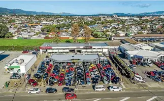  ??  ?? UNDER OFFER: 24 Railway Ave in Petone is currently leased as a car yard, but could be split into two tenancies.